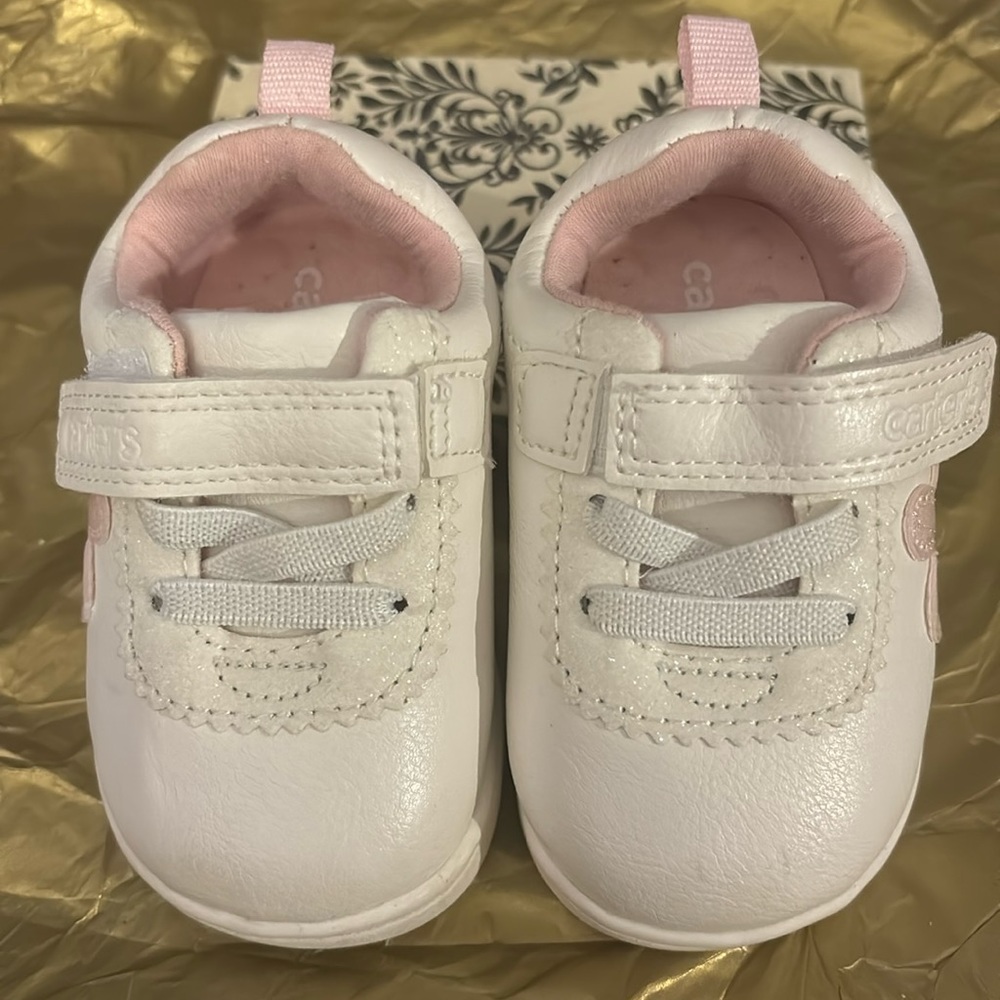 Carter’s white/pink toddler shoes. Size 2-5months.
